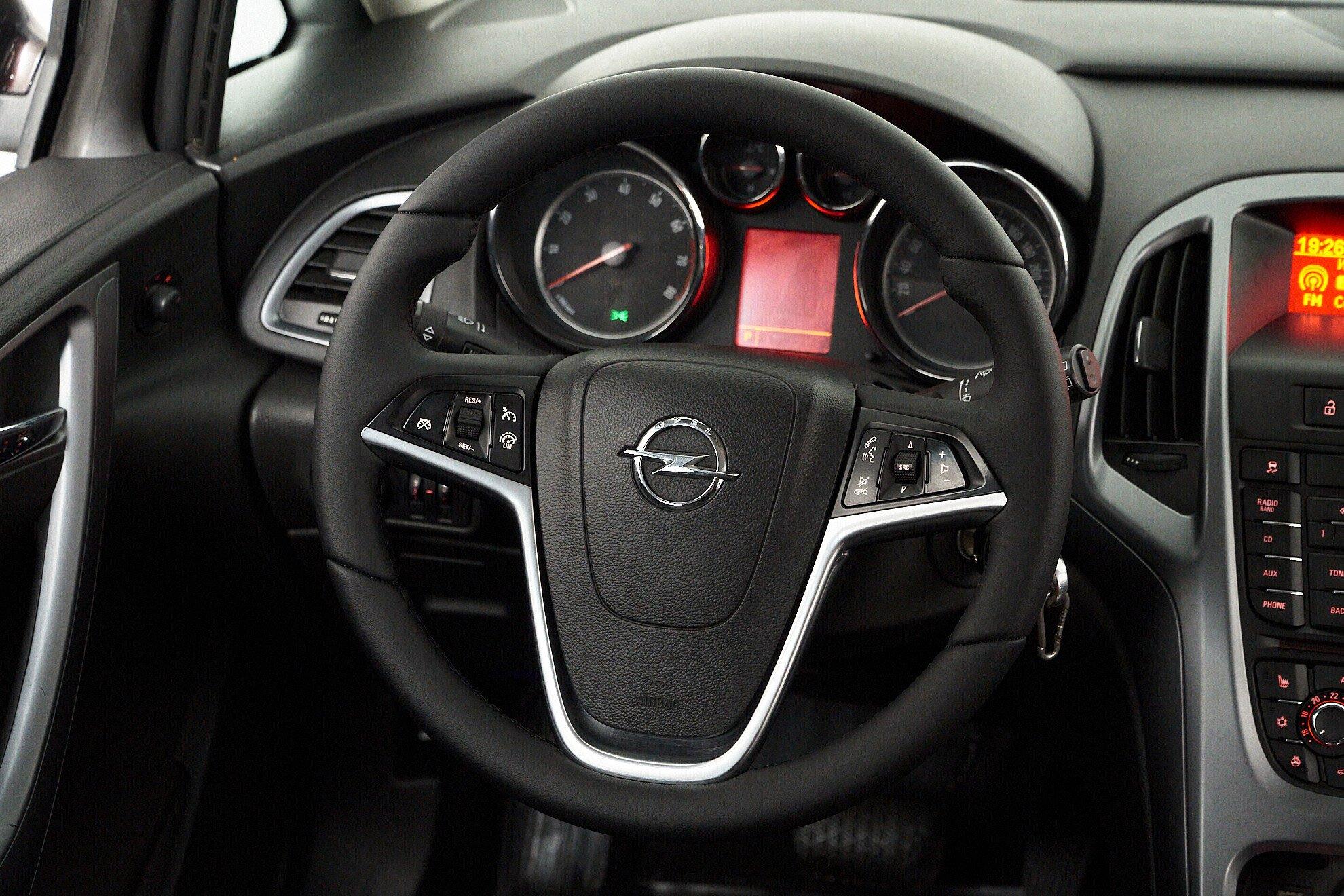 Opel Astra 2013, коричневый