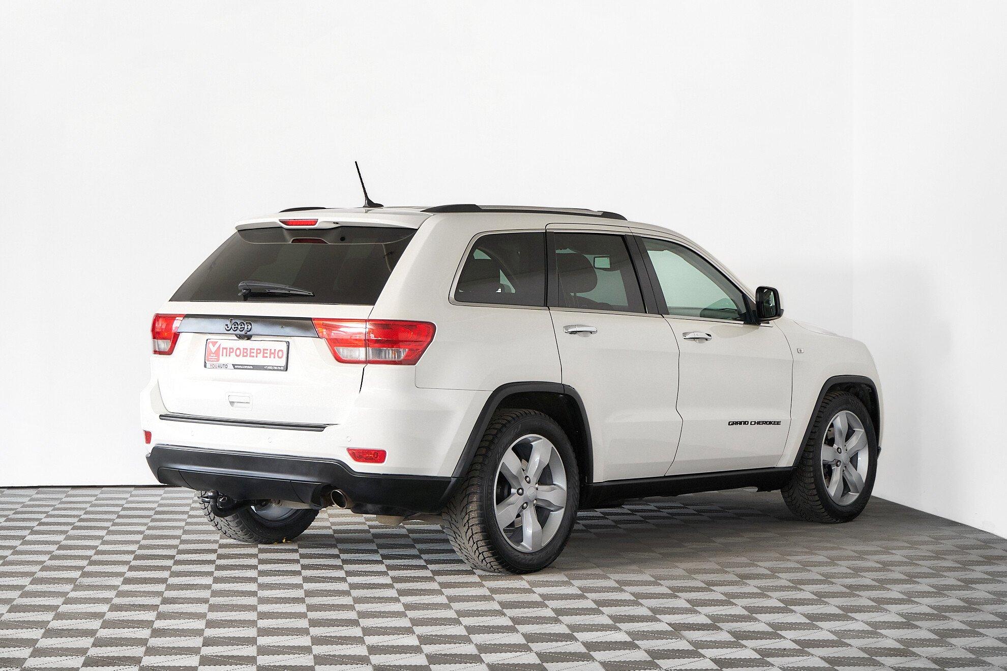 Jeep Grand Cherokee 2010, белый